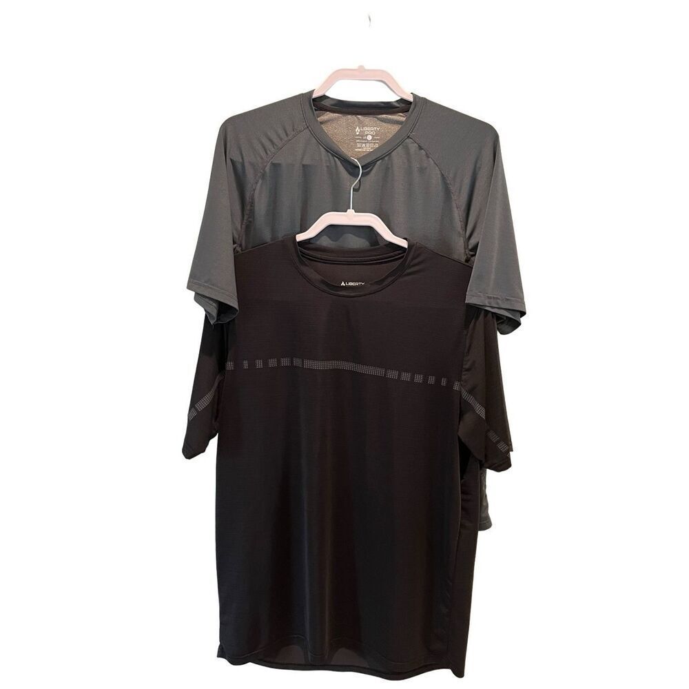 (2) Liberty Pro performance t-shirts (1) charcoal gray and (1) black - L